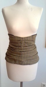 Waist cincher showing recycling from a pair of mens trousers